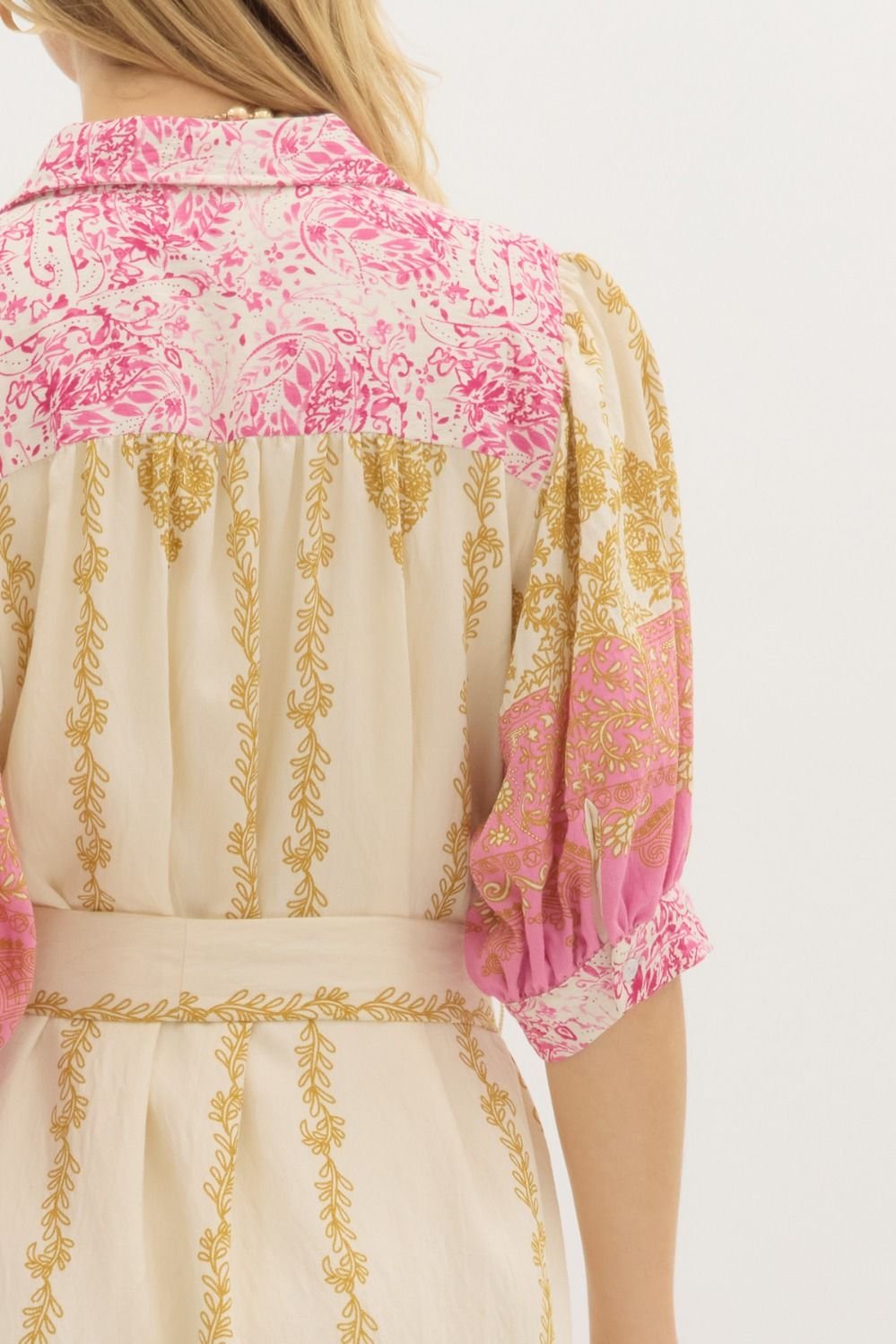 Stylish back view of Daydream Dress, a chic pink and gold midi dress perfect for beach outings and coastal boutique fashion.