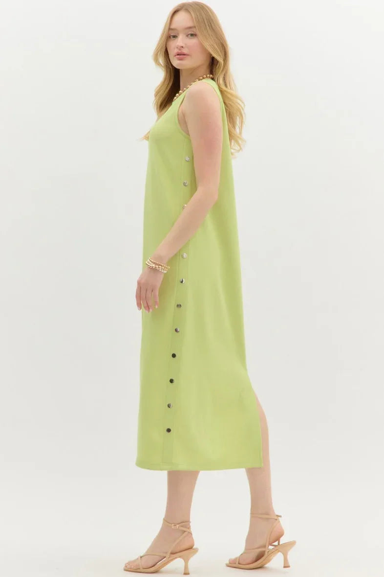 Lime green ribbed sleeveless midi dress with side buttons; perfect for beach days or tropical vacations at our Port Aransas boutique.