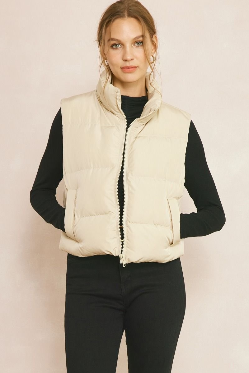 PUFFER VEST SANDSTONE from Raggdoll Boutique, trendy coastal style for your summer outfits in Texas.