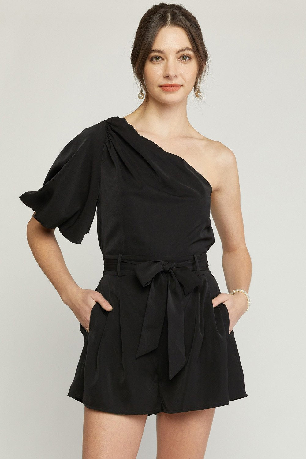 BLACK ONE-SHOULDER SATIN ROMPER displayed on a model, perfect for summer outfits Texas from Raggdoll Boutique.