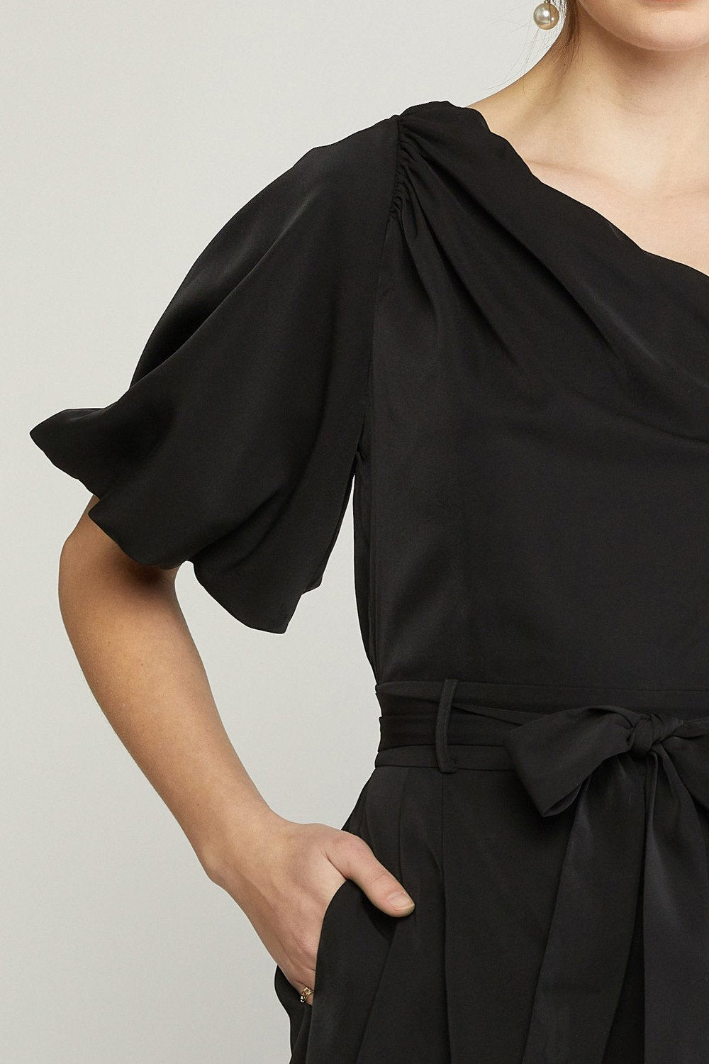 BLACK ONE-SHOULDER SATIN ROMPER featuring elegant satin fabric and trendy design from Raggdoll Boutique.