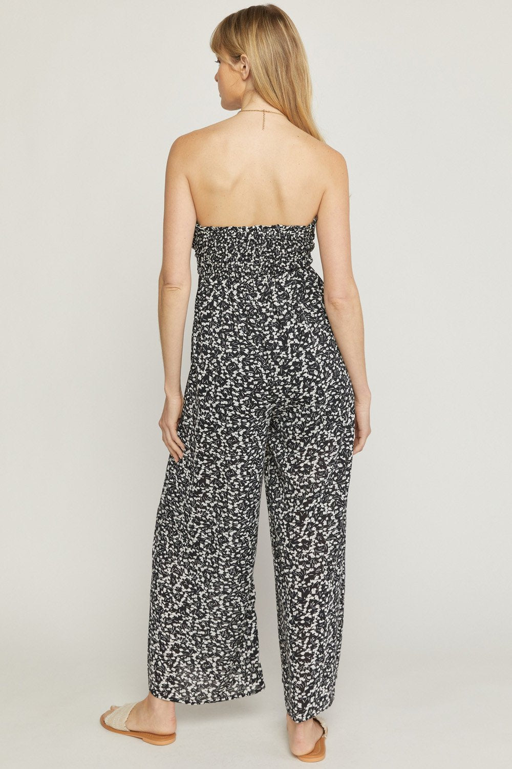 Back view of TIE FRONT BLACK AND WHITE JUMPSUIT from Raggdoll Boutique, perfect for summer outfits Texas and trendy coastal style.