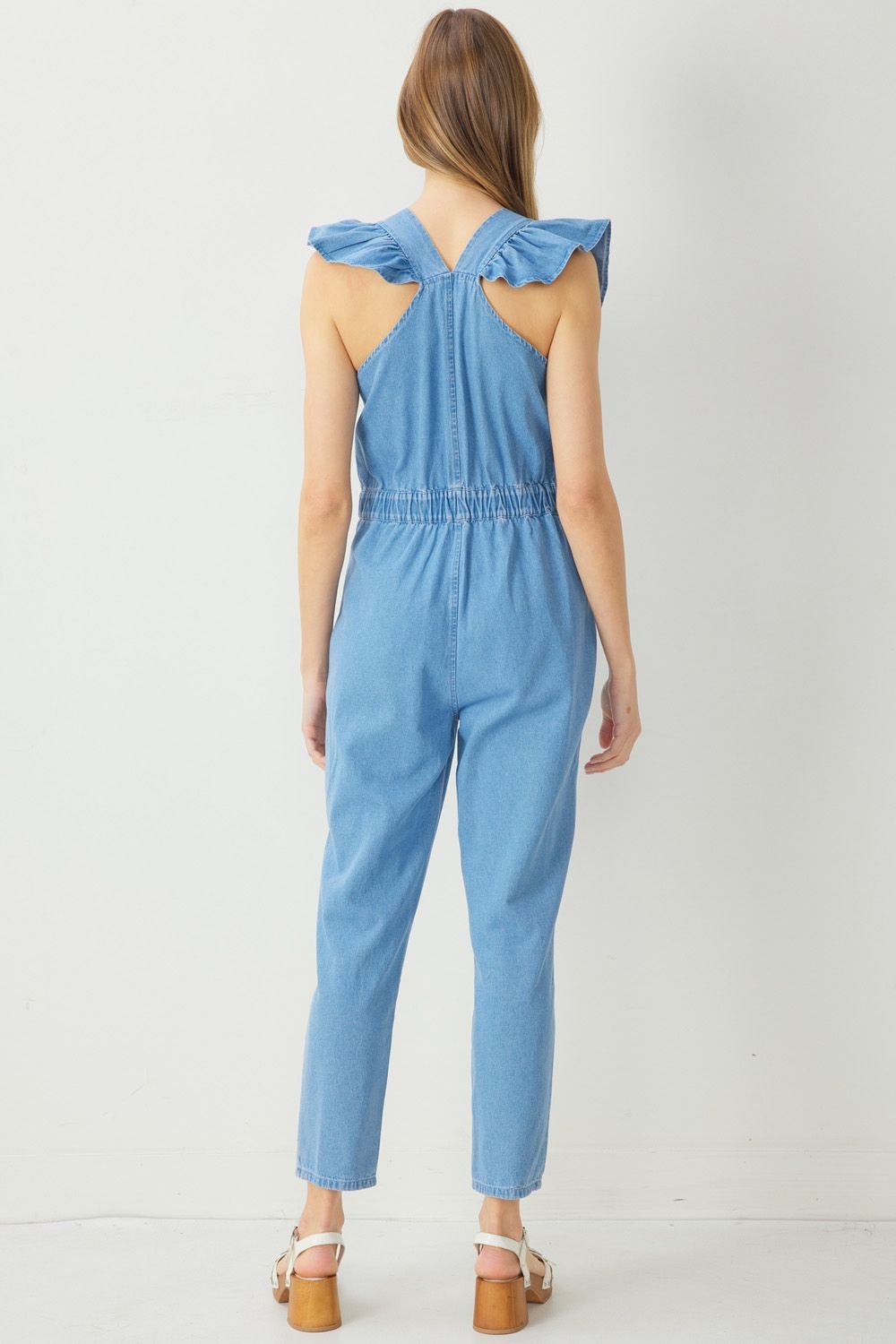 Back view of GO GIRL! DENIM JUMPSUIT from Raggdoll Boutique, perfect for summer outfits Texas and trendy coastal style.