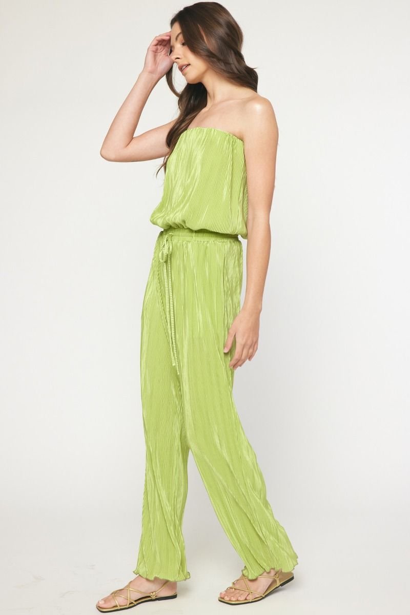 Model wearing APPLE GREEN JUMPSUIT from Raggdoll Boutique, ideal for trendy coastal style and summer outfits Texas.