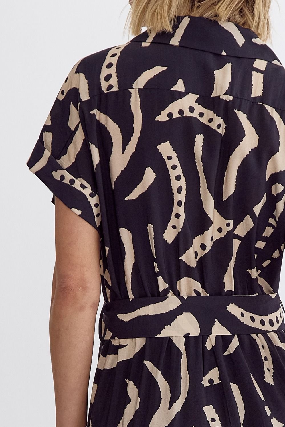 BLACK PRINT DETAIL JUMPSUIT showcased at Raggdoll Boutique, featuring trendy coastal style with unique print details.