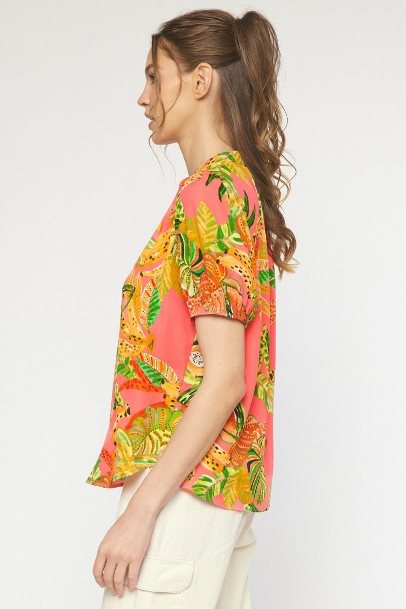 Stylish pink multi top with tropical print, perfect for beach dresses and coastal boutique clothing at Port Aransas.