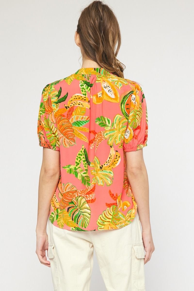 Back view of a pink multi top with tropical prints, perfect for coastal boutique clothing and stylish beach dresses.