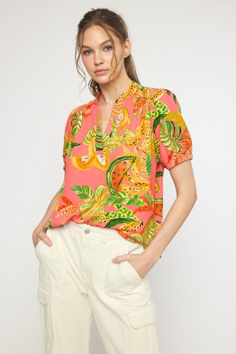 Stylish pink floral top for women, perfect for coastal boutique clothing and tropical vacation dresses.