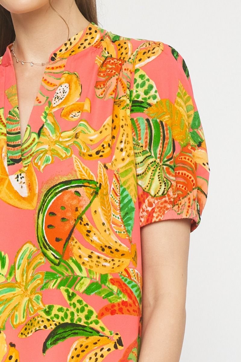 Stylish pink multi top featuring vibrant tropical prints, ideal for coastal boutique clothing and beach dresses.