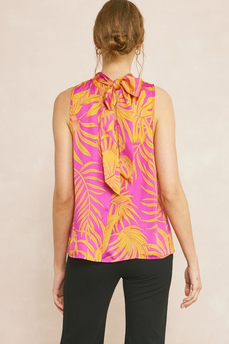 Back view of ORCHID AND ORANGE HALTER-STYLE TOP from Raggdoll Boutique, perfect for summer outfits Texas.