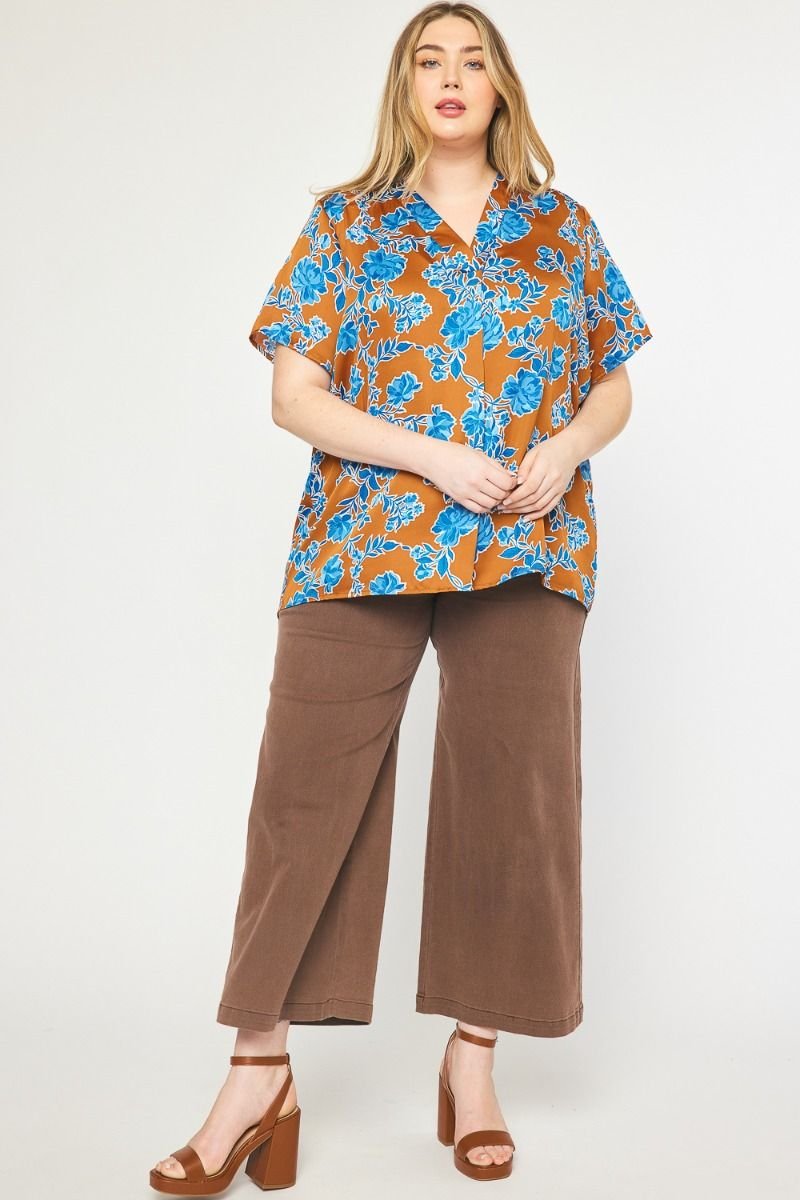 COPPER PLUS FLORAL TOP from Raggdoll Boutique, a trendy coastal style in Port Aransas boutique fashion.