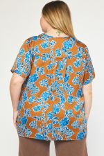 COPPER PLUS FLORAL TOP from Raggdoll Boutique featuring a vibrant floral pattern, perfect for trendy coastal style in Port Aransas.