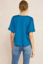 Back view of TEAL TOP WITH FRONT DETAIL from Raggdoll Boutique, perfect for coastal fashion and summer outfits Texas.