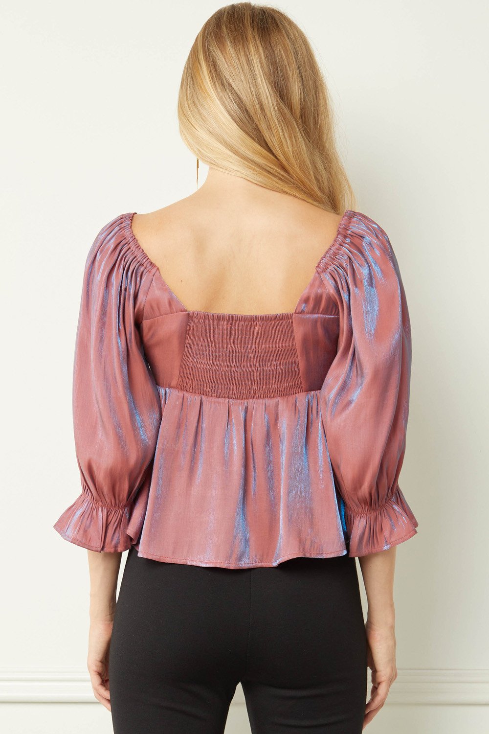 Back view of MARSALA TOP, iridescent v-neck babydoll top with smocking, from Raggdoll Boutique.