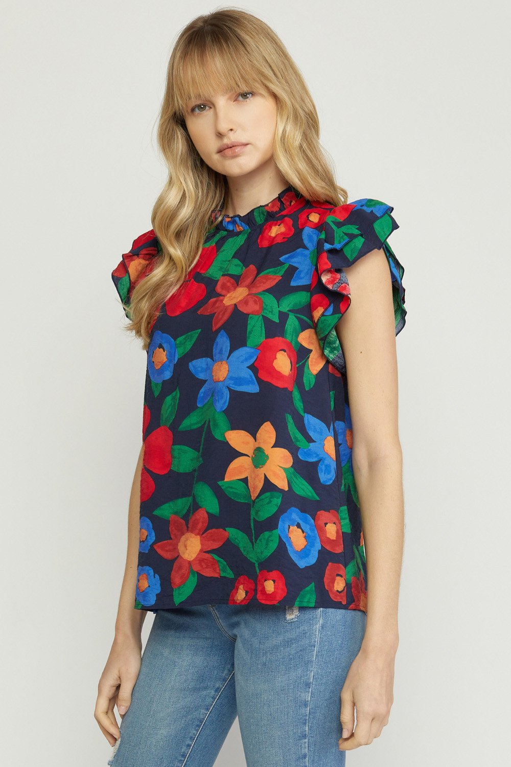 Navy Top with Flowers featuring colorful floral print, available at Raggdoll Boutique, perfect for trendy coastal style.