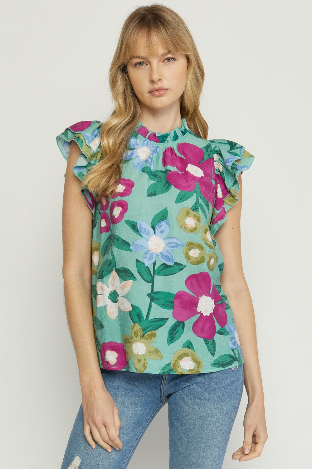 Mint Floral Top showcasing trendy coastal style from Raggdoll Boutique, perfect for vacation wardrobe and summer outfits Texas.