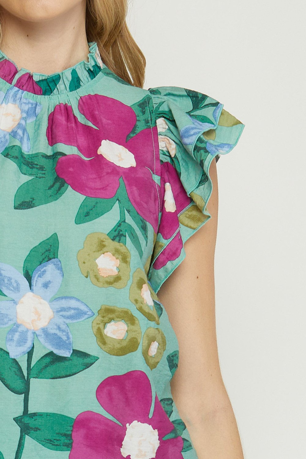 Mint Floral Top with vibrant floral pattern, perfect for summer outfits from Raggdoll Boutique.