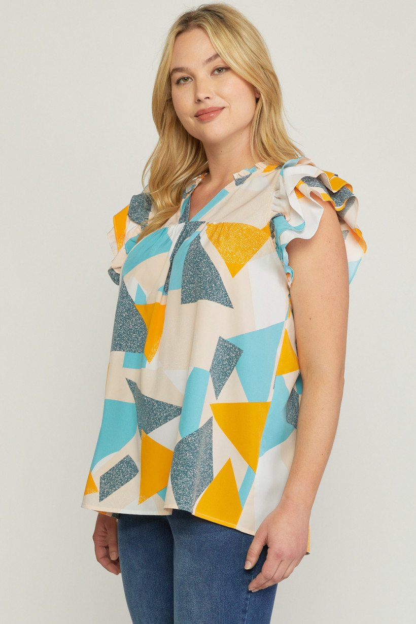 PLUS GOLD ABSTRACT TOP from Raggdoll Boutique features a trendy, lightweight design in bright colors.