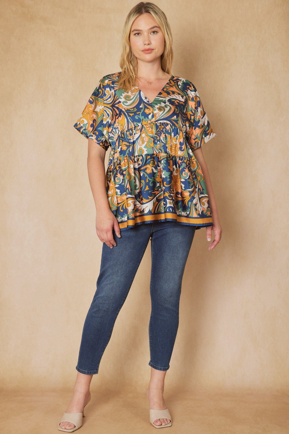 MIDNIGHT/GOLD PRINT KIMONO TOP modeled with jeans in a coastal fashion boutique style.