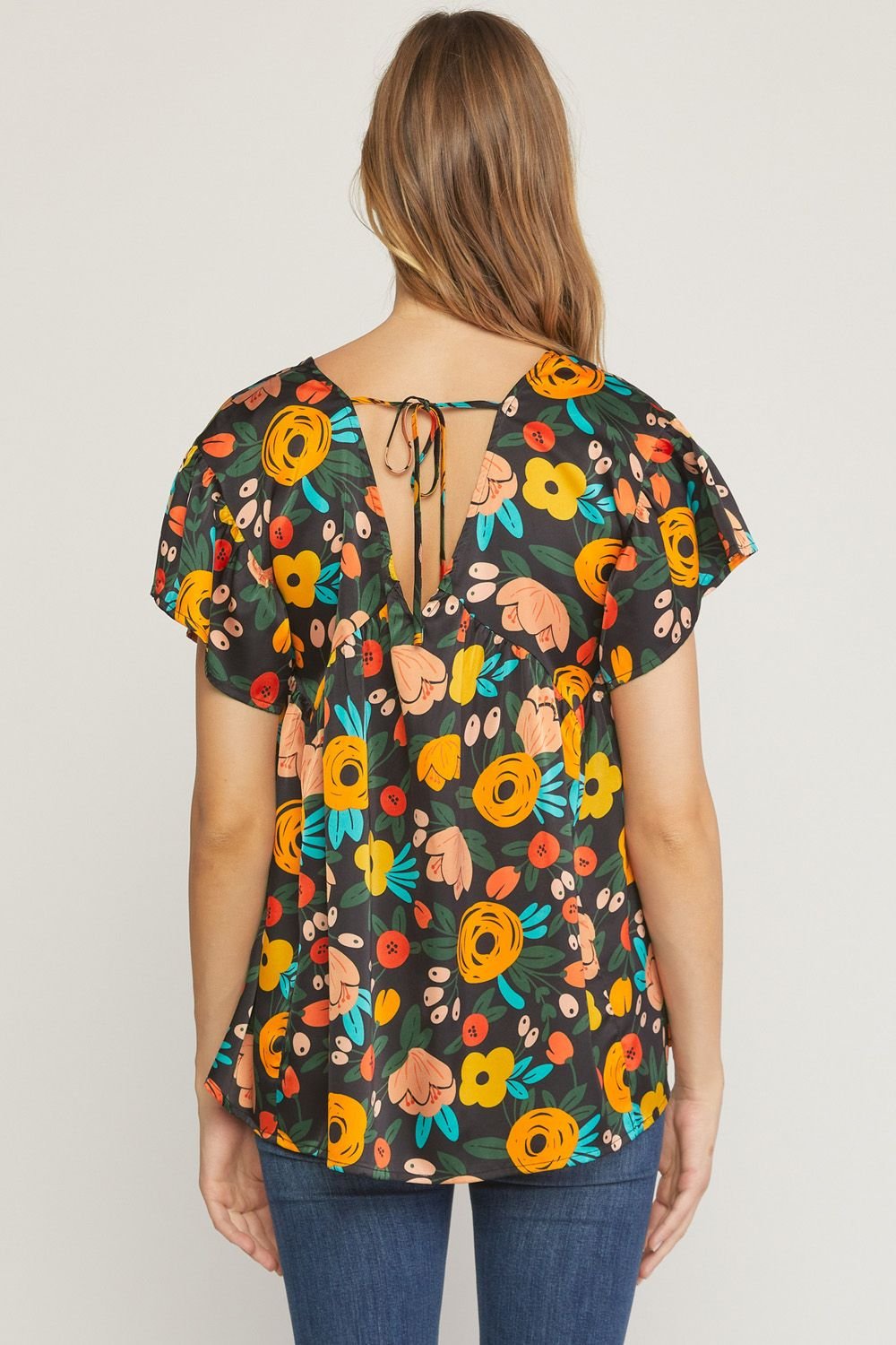 BLACK FLOWER PRINT TOP, trendy floral design for summer outfits, perfect for coastal fashion from Raggdoll Boutique.