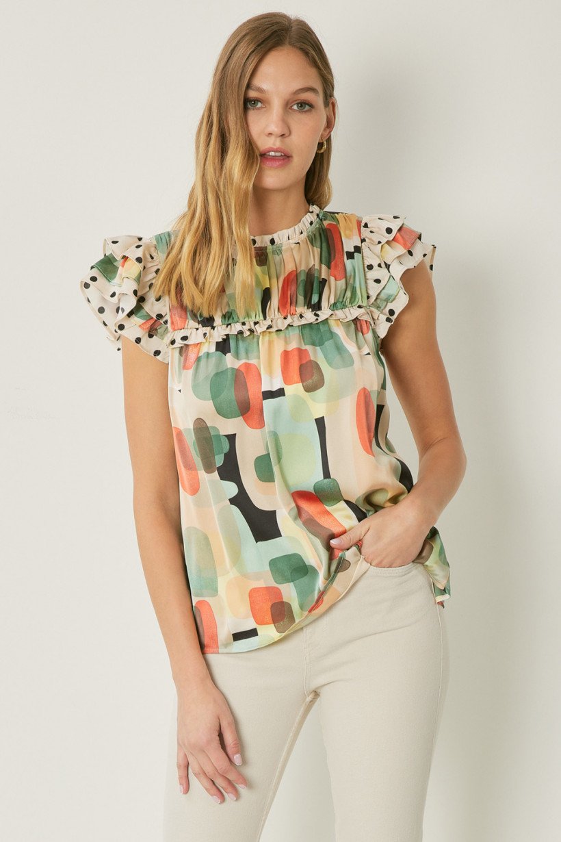 BLACK, GREEN, CORAL DOT RUFFLE TOP from Raggdoll Boutique, perfect for summer outfits in Port Aransas.