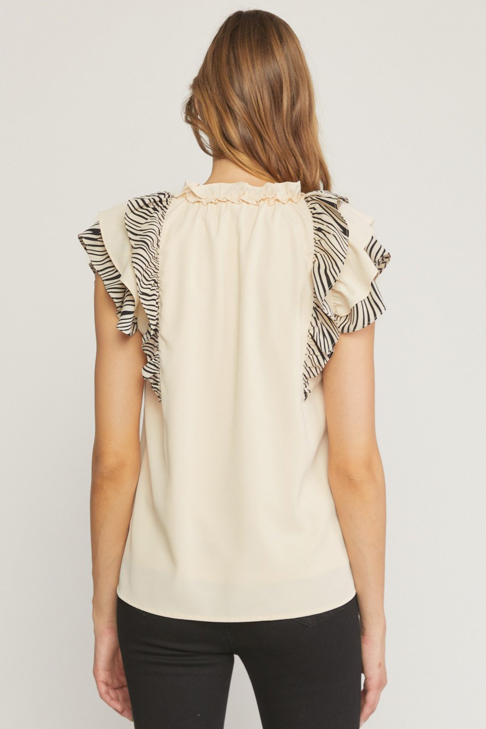CREAM AND BLACK WITH SLEEVE DETAIL, stylish women’s top from Raggdoll Boutique, perfect for summer outfits Texas.