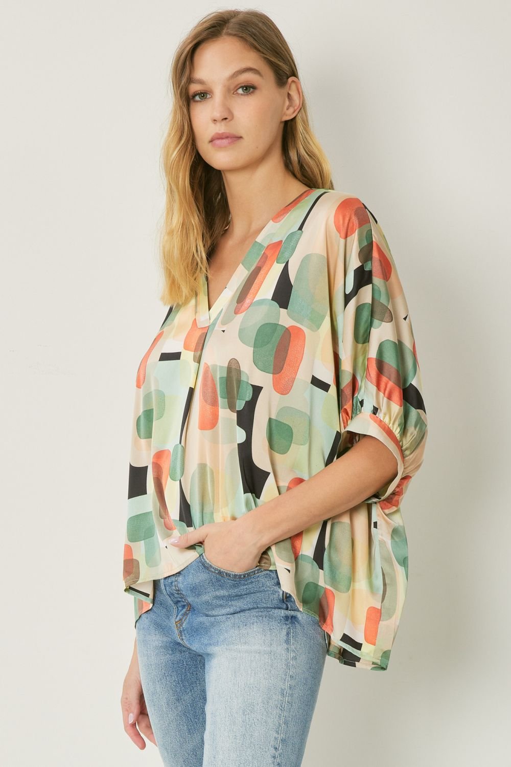MINT MULTI GRAPHIC TOP featuring colorful patterns, perfect for coastal boutique clothing and stylish tops for women.