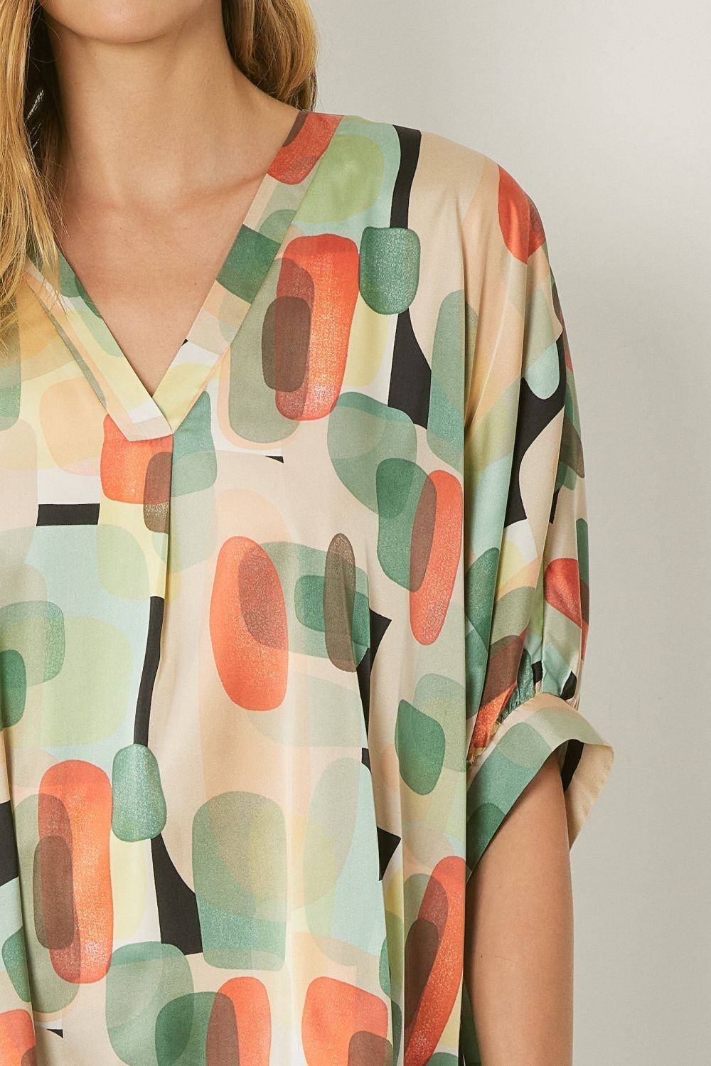 Mint multi graphic top for women, stylish and vibrant, perfect for coastal boutique clothing and tropical vacation dresses.