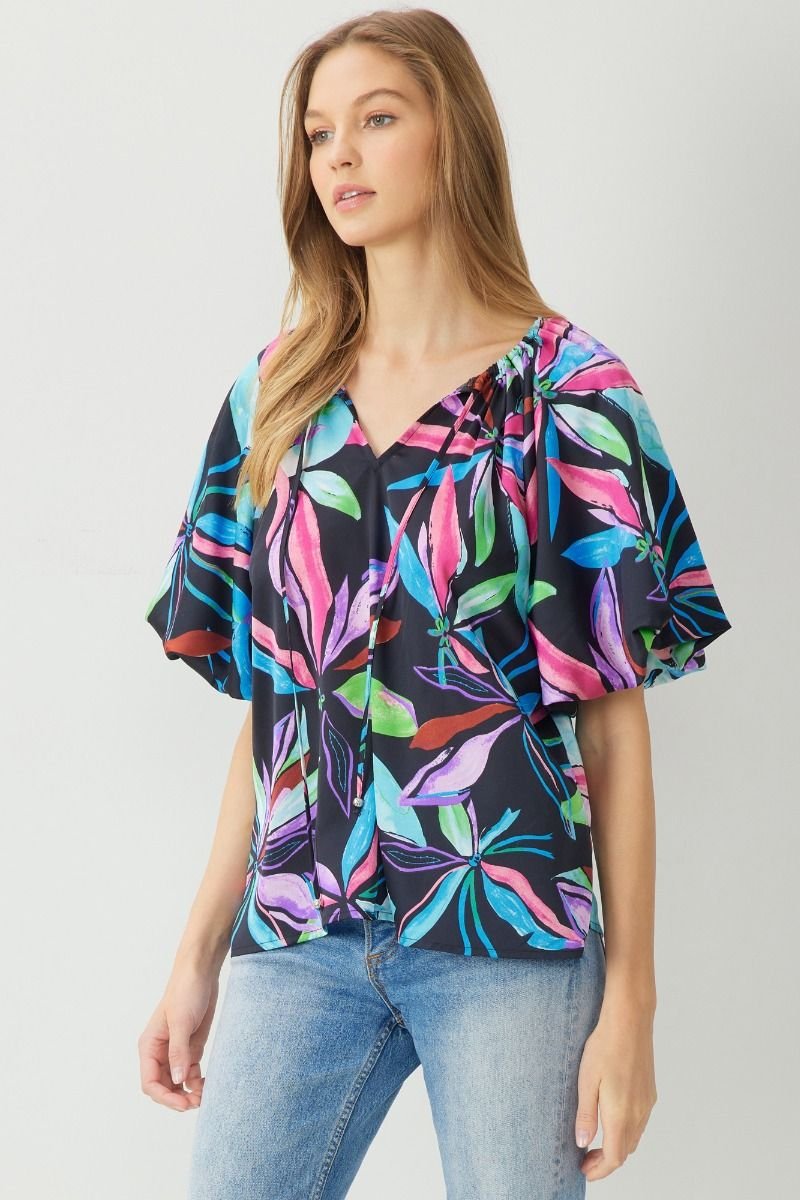 MULTI BLACK BUBBLE SLEEVE TOP from Raggdoll Boutique, perfect for vacation wardrobe and trendy coastal style.