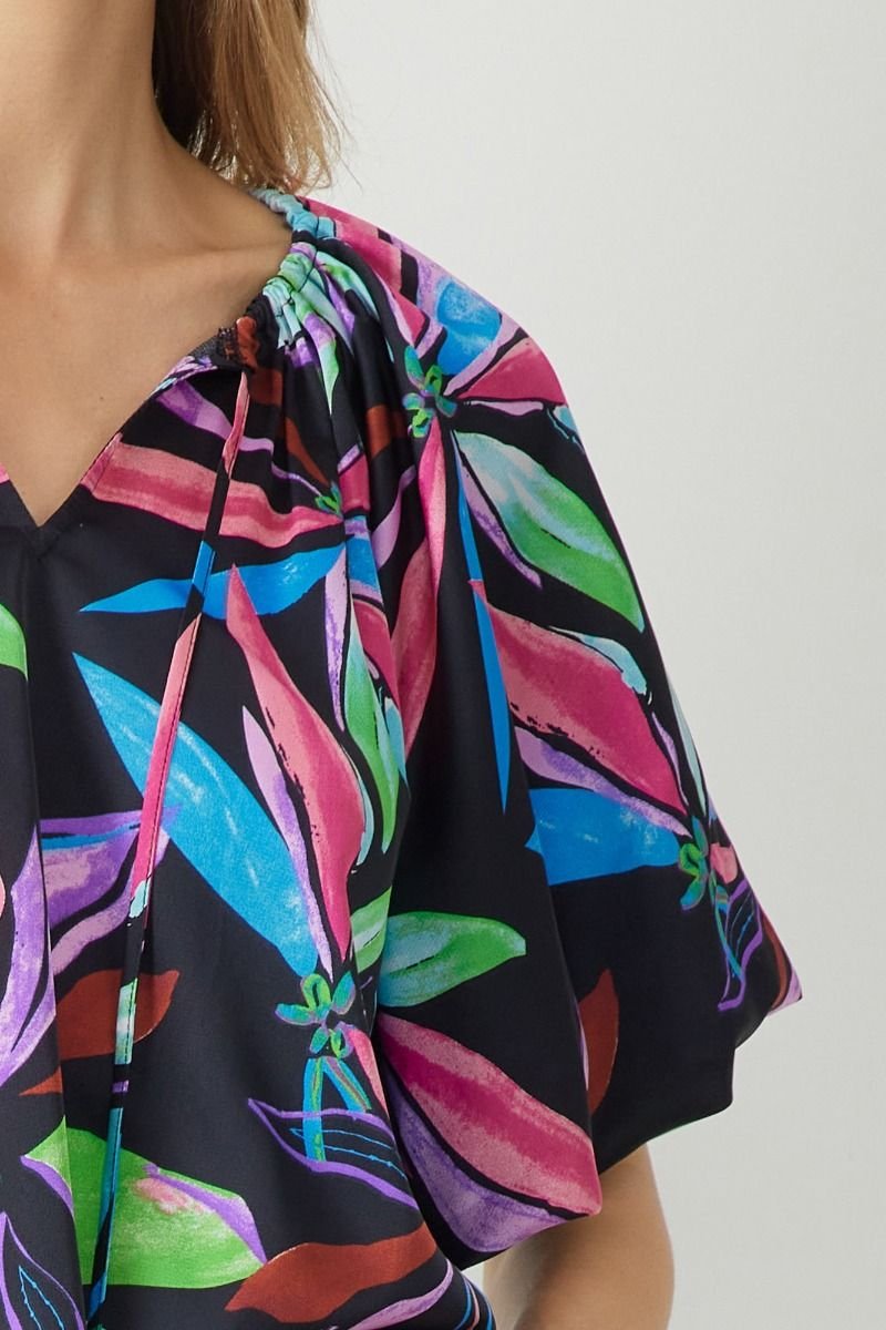 MULTI BLACK BUBBLE SLEEVE TOP from Raggdoll Boutique showcasing trendy coastal style and vibrant floral design.