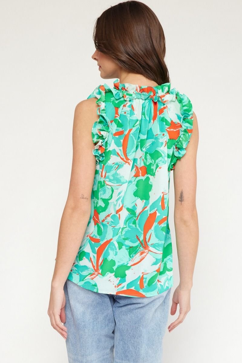 Model wearing a GREEN, RED, WHITE TOP from Raggdoll Boutique, showcasing trendy coastal style.