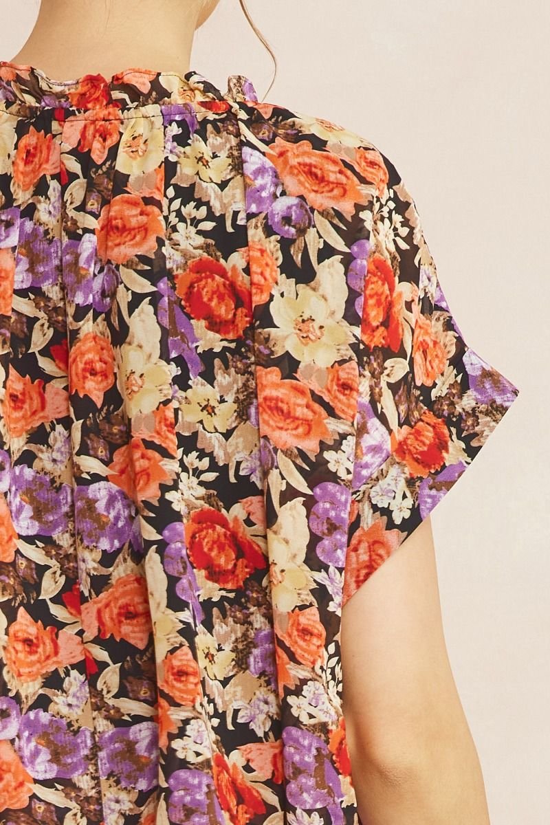 BROWN AND PINK FLORAL TOP WITH WAIST DETAIL featuring a vibrant floral pattern, perfect for trendy coastal style.