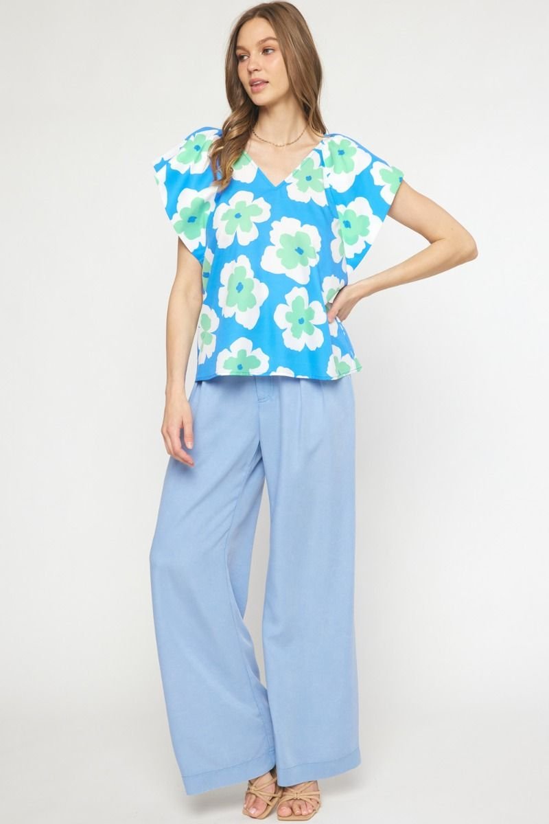 BLUE AND MINT ENTRO TOP paired with light blue wide-leg pants, perfect for coastal fashion and summer outfits.