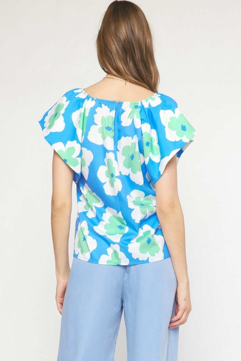 BLUE AND MINT ENTRO TOP with floral patterns, trendy boutique top from Raggdoll Boutique, Port Aransas.