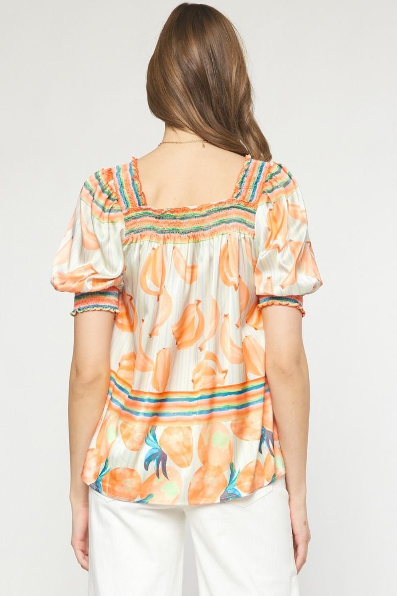 Back view of ORANGE MULTI TOP from Raggdoll Boutique, showcasing trendy coastal style and summer outfits Texas.