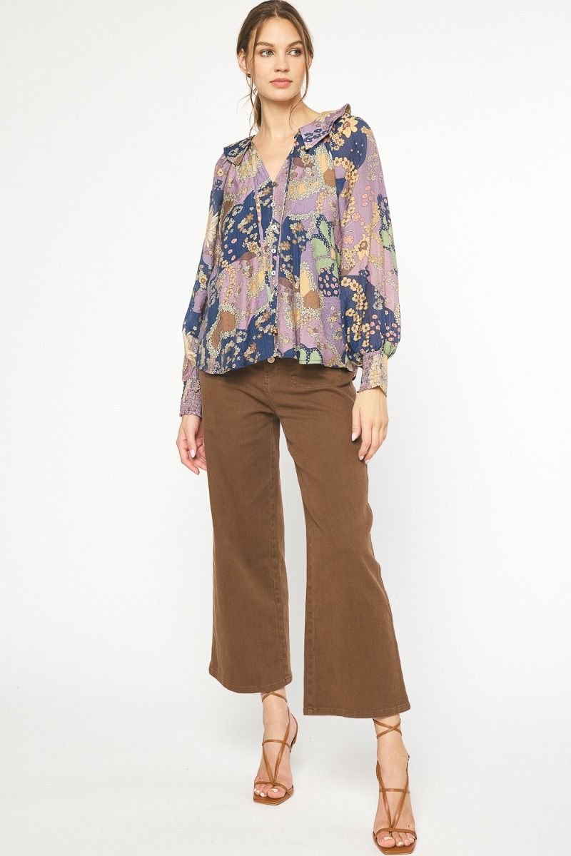 Model wearing FLORAL BABYDOLL TOP paired with trendy brown pants, perfect for summer outfits Texas at Raggdoll Boutique.
