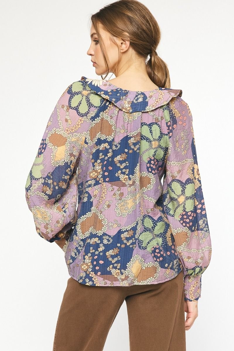 Floral Babydoll Top photographed from the back, showcasing trendy coastal style from Raggdoll Boutique.