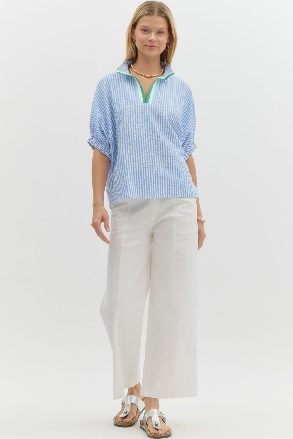 Fresh blue and white striped top with Kelly green detail, perfect for coastal boutique clothing and tropical vacation outfits.