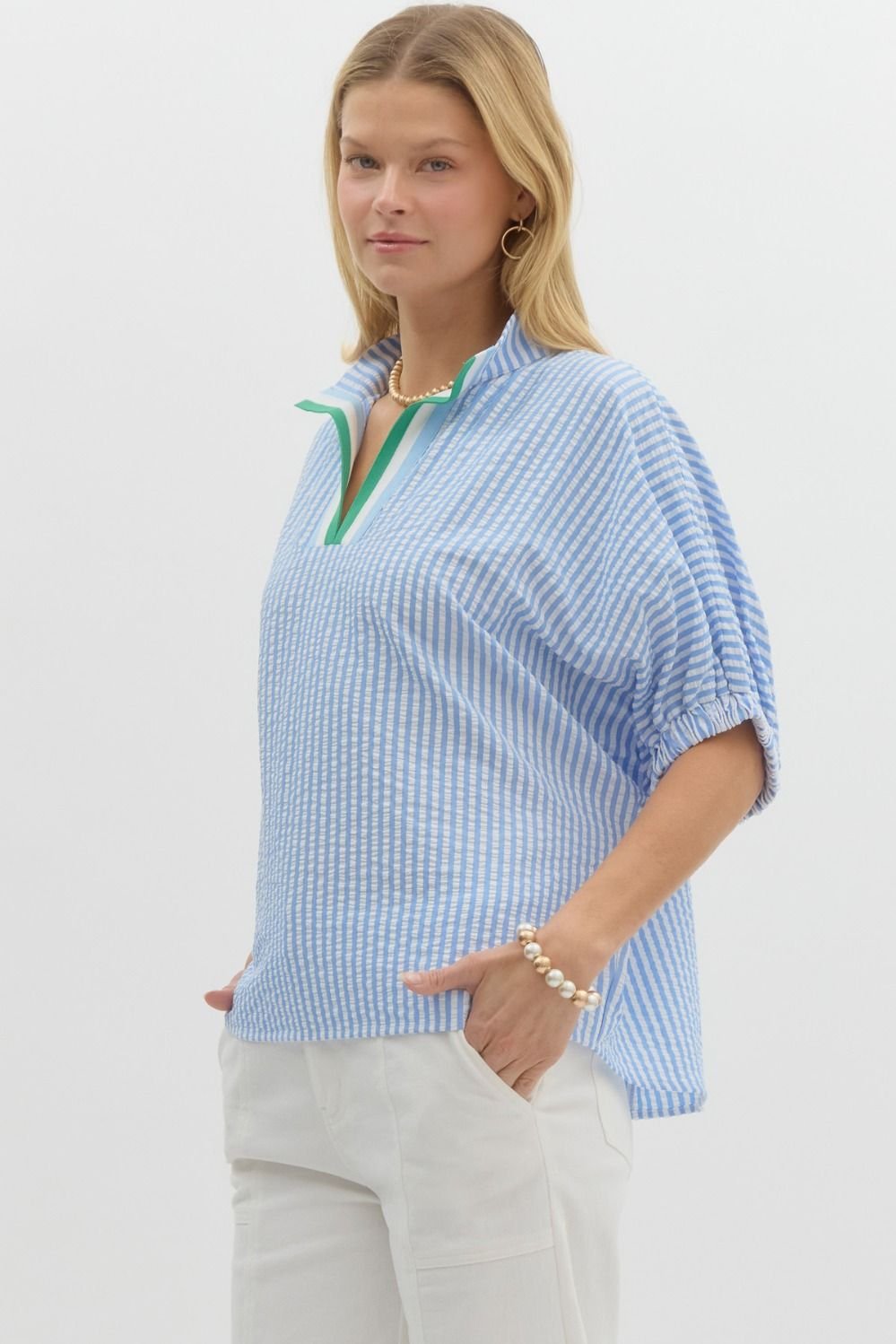 Fresh blue and white striped top with green detail, ideal for coastal boutique clothing and beach dresses.