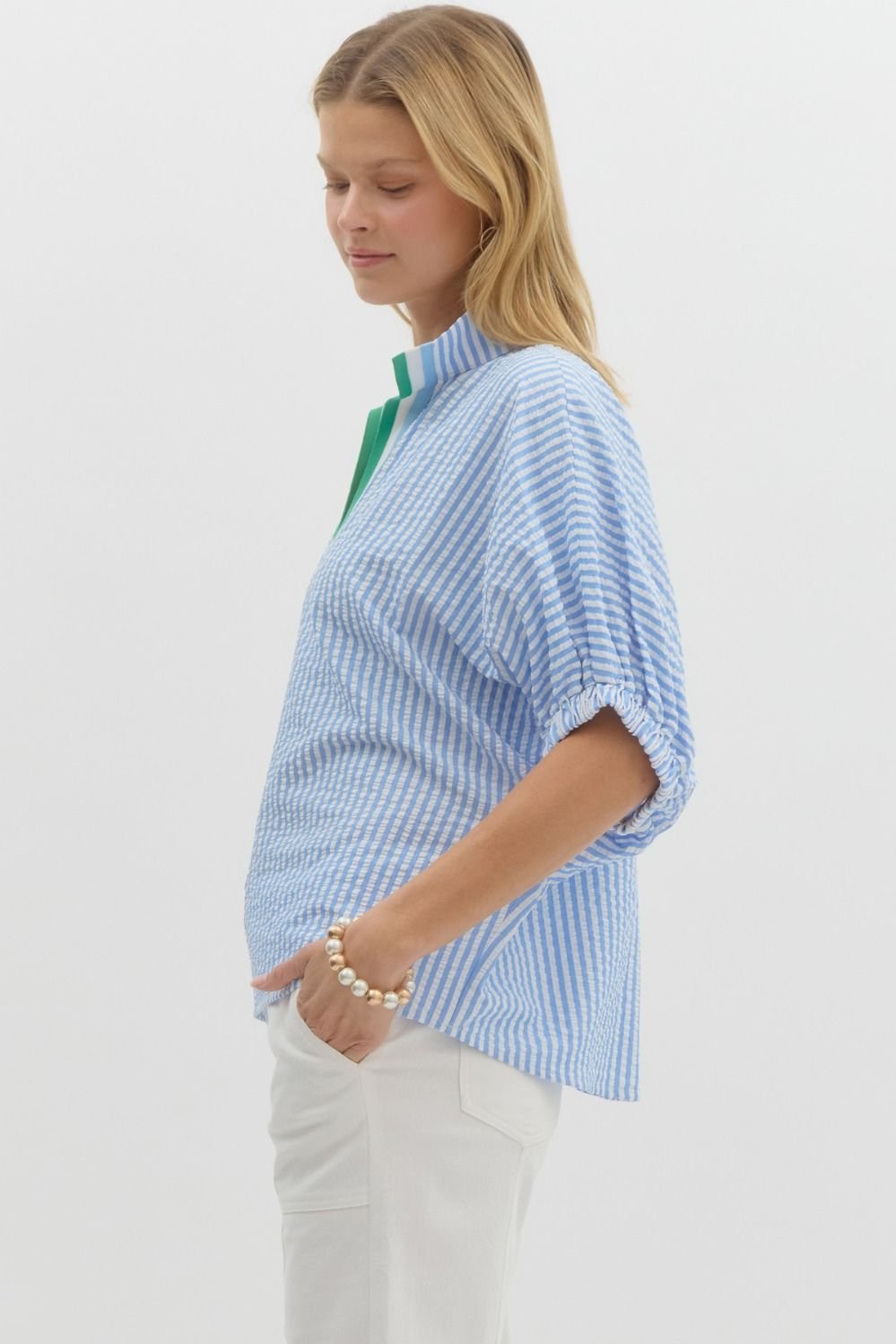Fresh blue and white striped top with Kelly green detail, ideal for coastal boutique clothing and tropical vacation dresses.