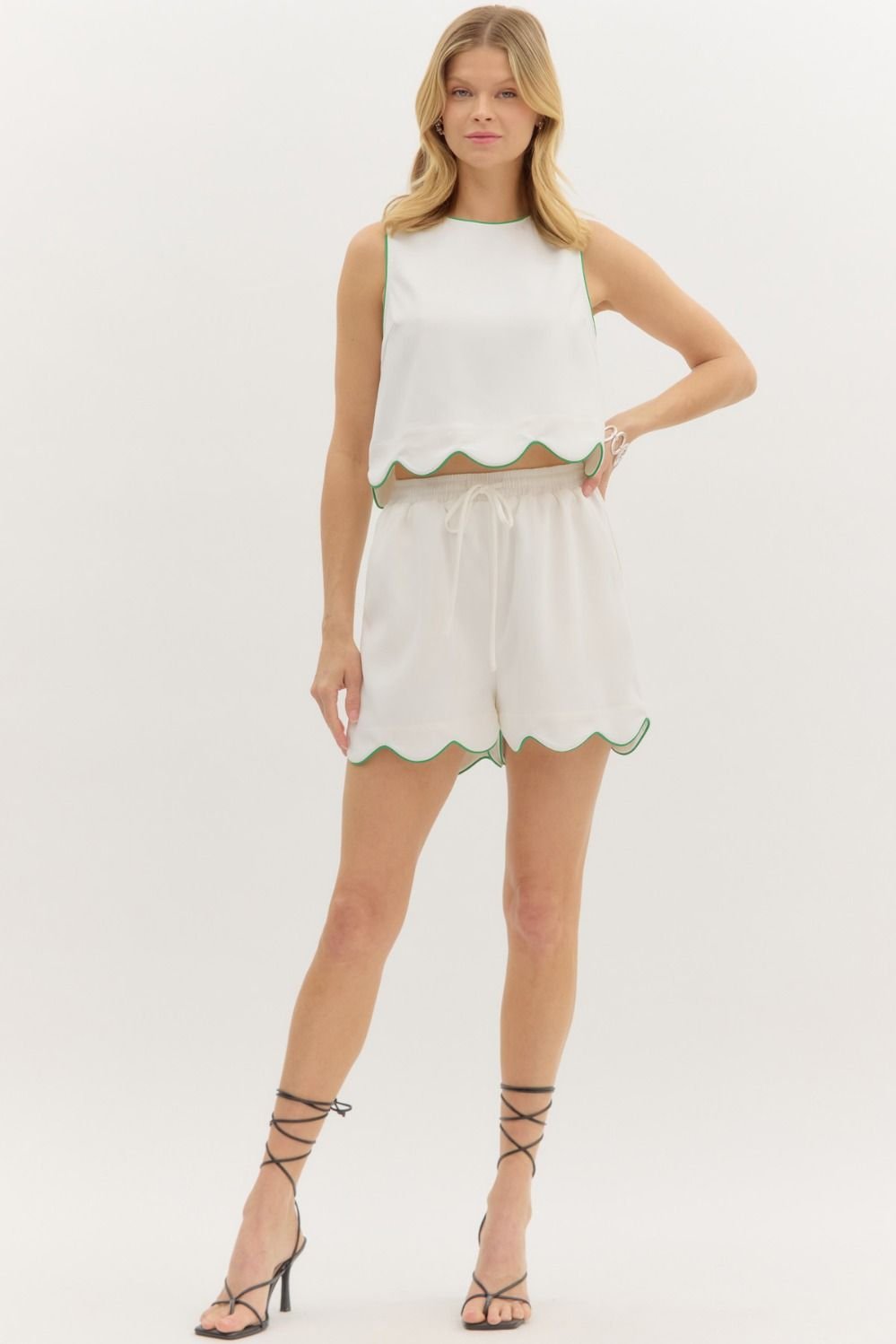 Coastal Scallop Set featuring a sleeveless top and shorts with green trim, perfect for beach dresses and curvy fashion.
