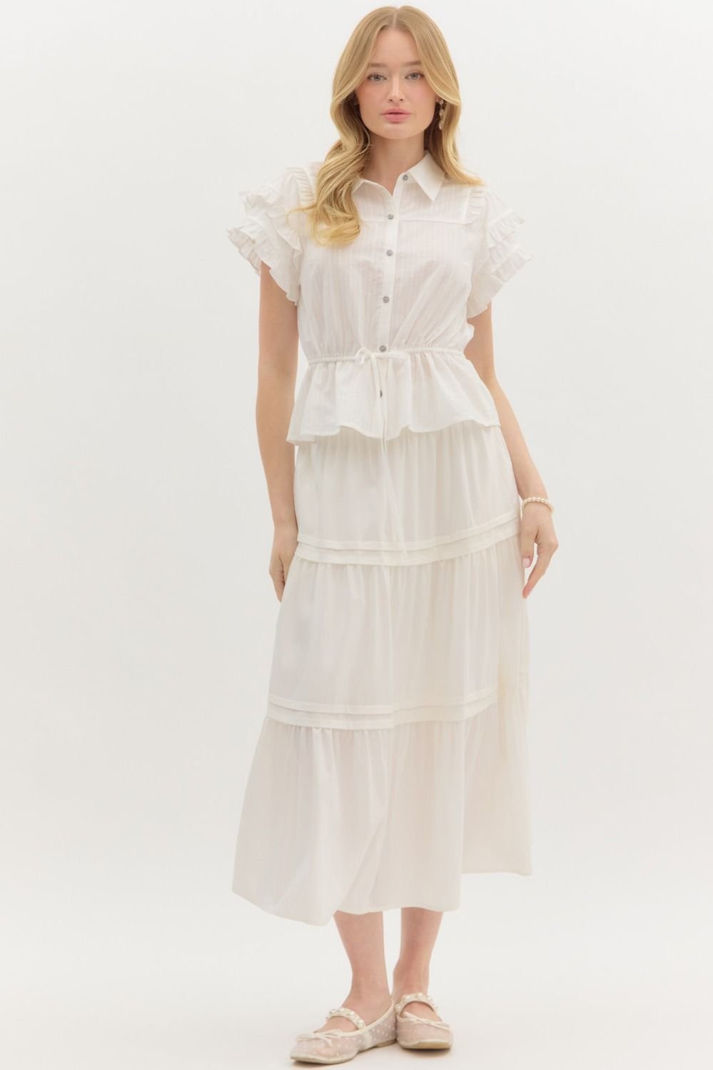 Ivory Dream Top with tiered flutter sleeves, ruffles, and adjustable waist tie, perfect for beach dresses and coastal boutique clothing.