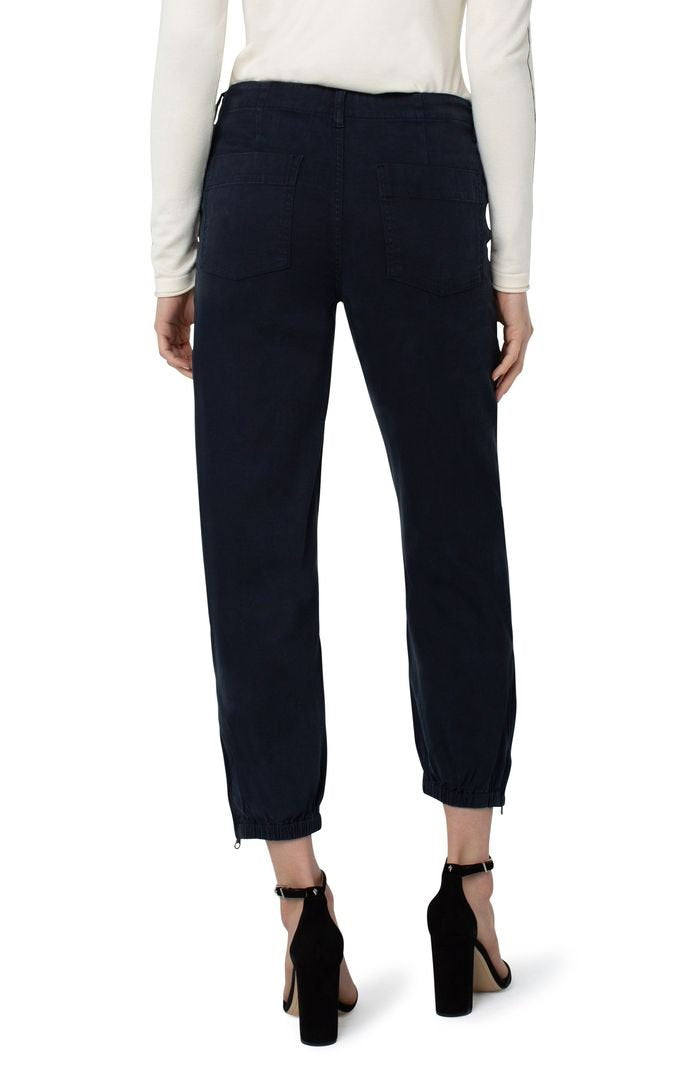 Carbon Clue Utility Pants showcased from the back, featuring zip hem at Raggdoll Boutique in Port Aransas.