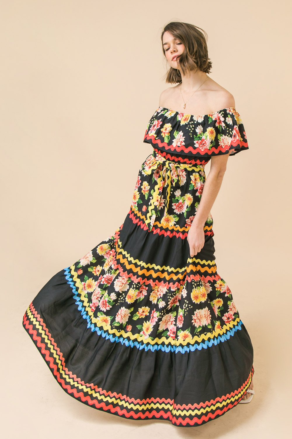 Model in a vibrant FLIRTY FIESTA DRESS from Raggdoll Boutique, ideal for trendy coastal style and summer outfits Texas.