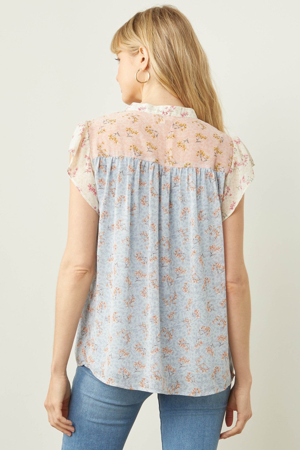 MIXED FLORAL TOP WITH FRONT DETAIL from Raggdoll Boutique, perfect for trendy coastal style and summer outfits Texas.
