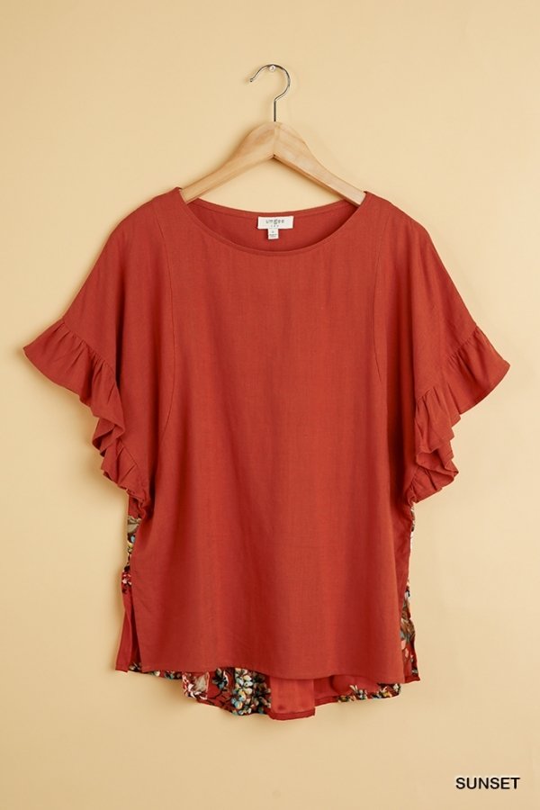 SUNSET TOP WITH BACK PRINT DETAIL featuring ruffle sleeves and floral print side slits from Raggdoll Boutique.