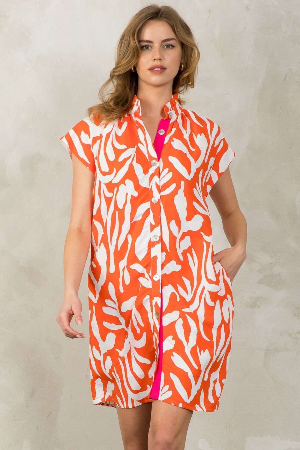 Model wearing THML Orange You Wonderful Dress, a trendy coastal style dress from Raggdoll Boutique.