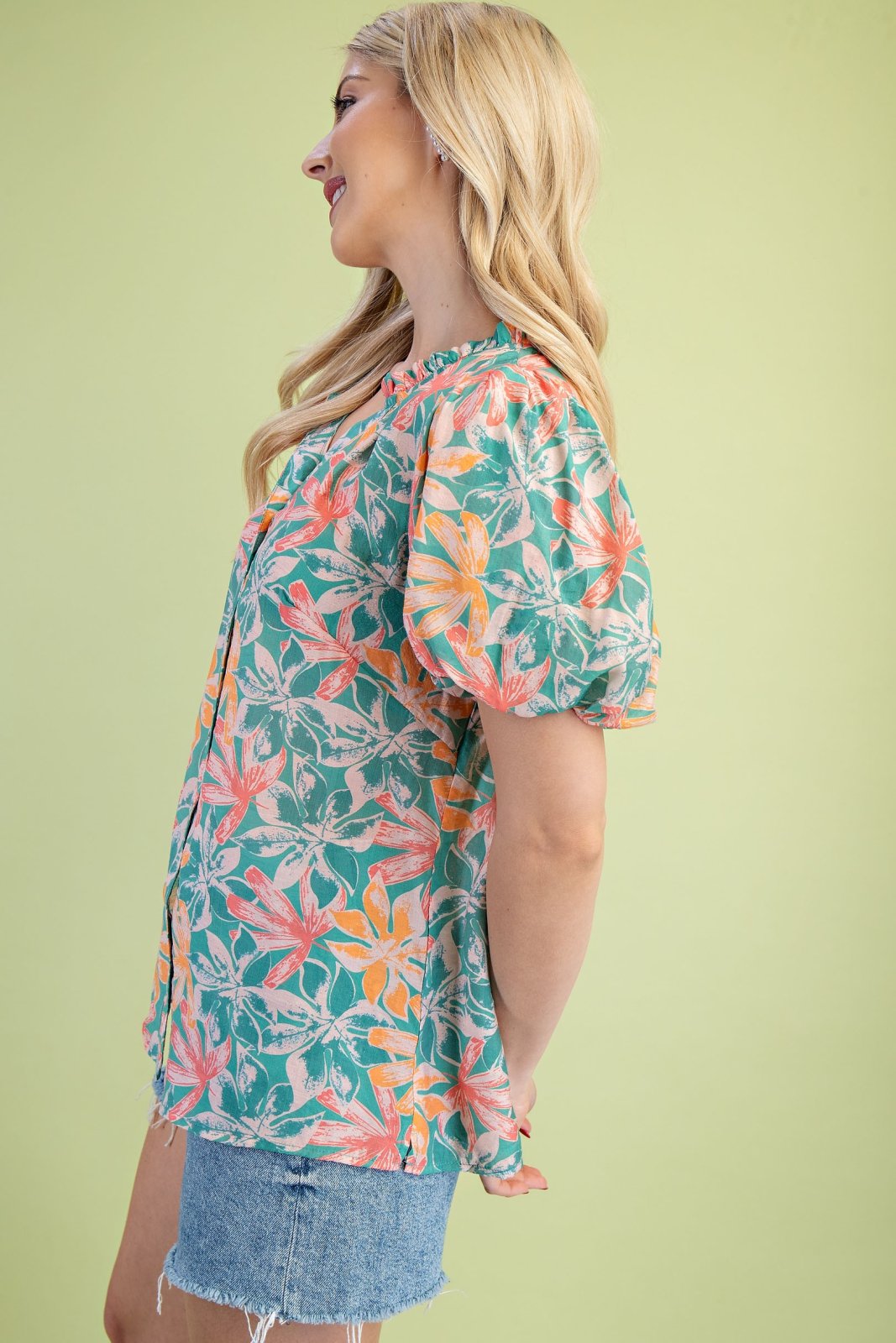 Floral green and orange button down top, perfect for spring! Ideal for coastal boutique clothing and Port Aransas styles.