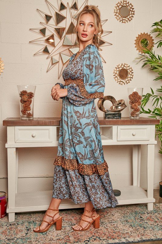 OMG! Blue and Tan Ruffled Midi Dress showcased in a stylish coastal setting, perfect for summer outfits Texas.