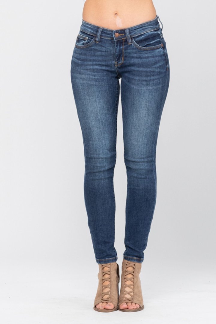 Judy Blue medium wash skinny jeans, mid rise, super stretch, perfect for coastal boutique clothing and curated women's fashion.